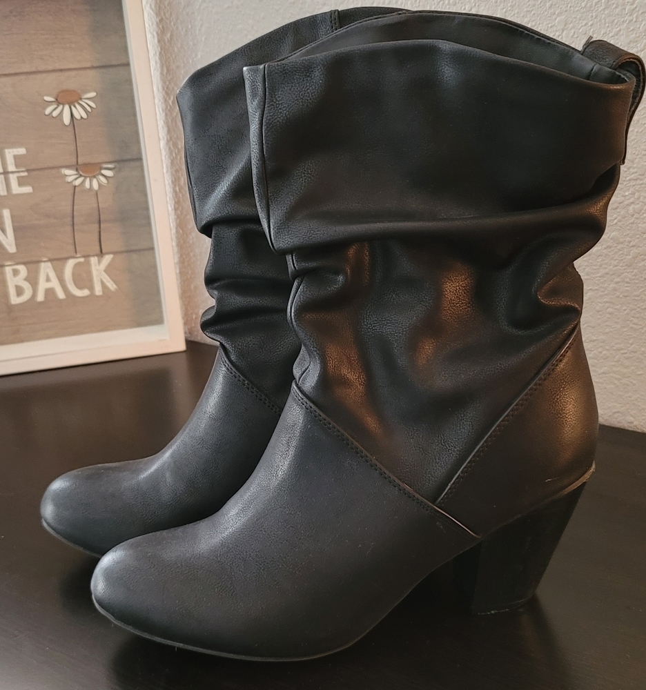 Black mid calf heal boot.